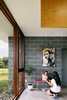 Modern home with Living Room, Wall Lighting, Bench, and Concrete Floor. Art Wall Photo 7 of Catskills House