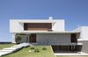 Modern home with Exterior, Wood Siding Material, Metal Siding Material, Concrete Siding Material, House Building Type, Flat RoofLine, Green Roof Material, Beach House Building Type, and Green Siding Material. IF House - Photo 01 Photo of IF House