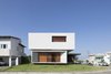 Modern home with Exterior, Beach House Building Type, House Building Type, Flat RoofLine, Concrete Siding Material, Metal Siding Material, Green Roof Material, Wood Siding Material, and Green Siding Material. IF House - Photo 02 Photo 2 of IF House