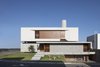 Modern home with Exterior, Wood Siding Material, Flat RoofLine, Concrete Siding Material, Green Roof Material, Metal Siding Material, House Building Type, Beach House Building Type, and Green Siding Material. IF House - Photo 12 Photo 12 of IF House