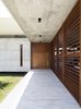 Modern home with Doors, Wood, Exterior, and Folding Door Type. IF House - Photo 03 Photo 3 of IF House