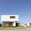 Modern home with Exterior, Glass Siding Material, House Building Type, Wood Siding Material, Green Roof Material, Beach House Building Type, Flat RoofLine, Green Siding Material, and Concrete Siding Material. IF House - Photo 16 Photo 16 of IF House