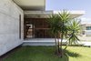 Modern home with Exterior, Flat RoofLine, Concrete Siding Material, Wood Siding Material, Beach House Building Type, House Building Type, Green Roof Material, and Green Siding Material. IF House - Photo 18 Photo 18 of IF House