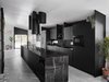 Modern home with Kitchen, Laminate Cabinet, Range, Drop In Sink, and Porcelain Tile Floor. This kitchen features a high-low mix of marble paired with laminate cabinetry by Lignum Cabinets. Photo 2 of Details