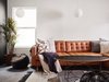 Modern home with Living Room, Porcelain Tile Floor, Pendant Lighting, and Sectional. Living room w/ pendant lights above the seating area Photo 5 of Details