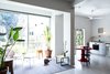 Modern home with Living Room, Pendant Lighting, and Concrete Floor. Living room and Kitchen (and Louie the dog) Photo 11 of Nahmani Tel Aviv Apartment