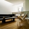 Modern home with Living Room, Chair, Sofa, Ceiling Lighting, Coffee Tables, and Gas Burning Fireplace. living room Photo 7 of Villa Hohenlohe
