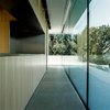 Modern home with Kitchen, Refrigerator, Drop In Sink, Metal Backsplashe, Limestone Floor, Ceiling Lighting, Wood Counter, and Wood Cabinet. kitchen Photo 9 of Villa Hohenlohe