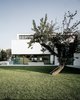 Modern home with Outdoor, Stone Patio, Porch, Deck, Front Yard, Grass, Stone Fences, Wall, Trees, Gardens, Landscape Lighting, Large Patio, Porch, Deck, and Walkways. front site Photo 2 of Villa Hohenlohe
