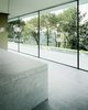 Modern home with Dining Room, Table, Limestone Floor, Ceiling Lighting, Chair, Gas Burning Fireplace, and Lamps. dining table Photo 5 of Villa Hohenlohe