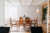 Modern home with Dining Room, Chair, Ceiling Lighting, Table, Recessed Lighting, and Light Hardwood Floor. Dining Room with lime-wash walls & dining room set found at a re-uzit store. Photo 15 of 1940's mid-century home gets a swift kick in the pants.