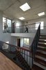 Modern home with Hallway and Medium Hardwood Floor. The openings on the walls and roof ensure the house is well illuminated and well ventilated, while creating the natural viewpoints for every space of the house. Photo 8 of Ninh Binh House