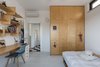 Neuman Hayner designed The House by the Dunes for a family of five who all enjoy surfing the beaches of Israel. The architects took a minimalist approach to designing each room, keeping colors and materials simple yet functional. Photo 16 of the house by the dunes modern home