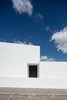 Modern home with Exterior, House Building Type, Stucco Siding Material, and Flat RoofLine. Southwest Façade, Entrance Photo of The Gafarim House