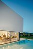 Modern home with Exterior, Flat RoofLine, House Building Type, and Stucco Siding Material. Southeast Façade Photo 18 of The Gafarim House