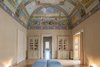 Modern home with Office, Chair, Bookcase, and Library Room Type. A bright, well-preserved fresco covers the ceiling of the airy common room. Photo 5 of Palazzo Daniele