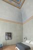 Modern home with Bedroom, Wall Lighting, Chair, Bed, and Terra-cotta Tile Floor. The suites exude a calm, monastic air. Photo 6 of Palazzo Daniele