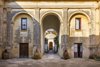 Modern home with Outdoor, Large Patio, Porch, Deck, Front Yard, and Stone Patio, Porch, Deck. Palazzo Daniele's stunning courtyard. In the distance is the circular-domed Kaffeehaus, a one-time aristocratic hangout where guests can now savor candle-lit dinners. Photo 3 of Palazzo Daniele