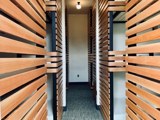 The bunk room is decked out with custom lockers and benches.