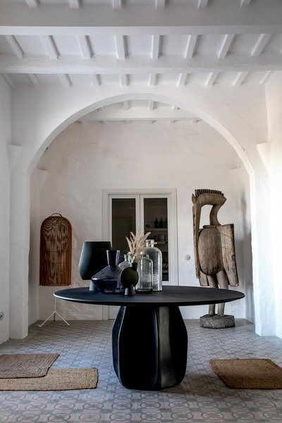 Handmade tiles, many of them beautifully preserved, unify the house's aesthetic.