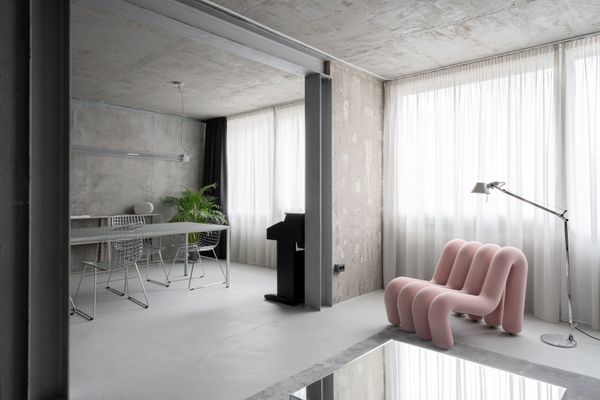 By combining two rooms into one commodious living and dining space, reinforced by steel columns and beams, the apartment flaunts an airy feel.