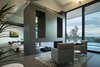 Modern home with Living Room, Accent Lighting, End Tables, Gas Burning Fireplace, Bookcase, Porcelain Tile Floor, Coffee Tables, Ceiling Lighting, Sofa, Slate Floor, Console Tables, Floor Lighting, Chair, Pendant Lighting, Recessed Lighting, Track Lighting, Limestone Floor, Ottomans, Sectional, and Table Lighting. La Vinya, PGA Golf Resort | Studio RHE Photo 3 of La Vinya, PGA Golf Resort