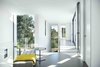 Modern home with Hallway, Porcelain Tile Floor, Concrete Floor, Slate Floor, and Ceramic Tile Floor. La Vinya, PGA Golf Resort | Studio RHE Photo 8 of La Vinya, PGA Golf Resort
