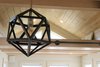 Modern home with Dining Room and Pendant Lighting. The light fixture feature hangs over the eating bar and ads a designer touch to the space. Photo 8 of Innisfree Anarres