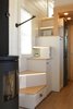 Modern home with Staircase, Wood Tread, and Metal Railing. Storage stairs lead to the master loft and come complete with LED stair lighting on a 3 way switch for convenience. Photo 3 of Innisfree Anarres