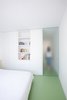 Modern home with Bedroom, Wardrobe, Recessed Lighting, Bed, Shelves, Bookcase, and Storage. Bedroom Photo 8 of Apartamento Picasso