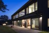 Modern home with Exterior, Metal Roof Material, Glass Siding Material, House Building Type, A-Frame RoofLine, and Wood Siding Material. 2 Barns Photo 5 of 2 Barns