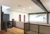 Modern home with Office, Medium Hardwood Floor, Study Room Type, and Library Room Type. Custom designed lift Photo 7 of 2 Barns