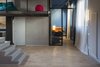 Modern home with Living Room, Ceiling Lighting, Light Hardwood Floor, Track Lighting, and Accent Lighting. Iron loft and blue room Photo 4 of Blue and concrete apartment