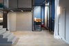 Modern home with Living Room, Accent Lighting, Track Lighting, Light Hardwood Floor, and Ceiling Lighting. Iron loft and blue room Photo 12 of Blue and concrete apartment