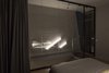 Modern home with Light Hardwood Floor, Accent Lighting, and Wall Lighting. Bedroom in the night, led light Photo 18 of Blue and concrete apartment