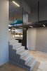 Modern home with Staircase and Concrete Tread. Concrete podium and iron loft Photo 13 of Blue and concrete apartment