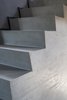 Modern home with Staircase and Concrete Tread. Concrete podium Photo 14 of Blue and concrete apartment