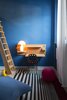 Modern home with Chair and Light Hardwood Floor. Blue room and POI system writing desk Photo 15 of Blue and concrete apartment