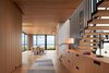 Modern home with Staircase, Wood Tread, and Metal Railing. Entry facing West towards Lake Michigan Photo 17 of St Joseph Beachfront Home