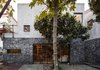 Modern home with Windows. The front facade Photo of La Pancha House". Handcrafted Architecture in the South of Mexico City.