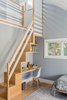 Modern home with Bedroom, Chair, Bed, Light Hardwood Floor, and Shelves. The children's bedrooms all have some sort of nook or space that is special. This room has a custom built-in staircase up to a reading nook. Photo 8 of Mid Century Style