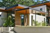 Modern home with Exterior, Stucco Siding Material, Flat RoofLine, House Building Type, Wood Siding Material, Glass Siding Material, and Shed RoofLine. Mount Pleasant Modern: Main Entry Photo 2 of Mount Pleasant Modern