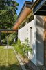 Modern home with Exterior, House Building Type, Wood Siding Material, Flat RoofLine, Glass Siding Material, Shed RoofLine, and Stucco Siding Material. Mount Pleasant Modern: Front Elevation Photo 3 of Mount Pleasant Modern