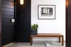 Modern home with Hallway and Ceramic Tile Floor. Juxtaposition of the old and new at the apartment entry Photo of Quarry Bay Residence