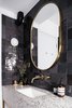 Modern home with Bath Room, Wall Lighting, Recessed Lighting, and Drop In Sink. Guest bathroom detail with terrazzo, dark grey tiles, and brass accents Photo 14 of Quarry Bay Residence