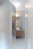 Modern home with Bath Room, Ceiling Lighting, Wall Lighting, Ceramic Tile Floor, and Ceramic Tile Wall. The mirrored door opens on the bathroom Photo 6 of Corner apartment in Strasbourg, France