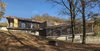 Modern home with Exterior, Brick Siding Material, Concrete Siding Material, Metal Siding Material, Flat RoofLine, House Building Type, and Wood Siding Material. Two elongated volumes pivot around the cubic volume of the common staircase Photo 2 of Villa Rambo