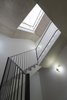 Modern home with Staircase, Metal Railing, and Concrete Tread. The exposed concrete structure enhance the brightness and the simplicity of the space. Photo 9 of Villa Rambo
