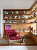 Modern home with Living Room, Chair, Floor Lighting, and Medium Hardwood Floor. Brazilian designer Sergio Rodrigues’s armchair in the reading corner. Photo 3 of The JB apartment
