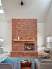 Modern home with Living Room, Medium Hardwood Floor, Recessed Lighting, Sofa, Standard Layout Fireplace, and Chair. Living Room Photo 4 of OKC Farmhouse